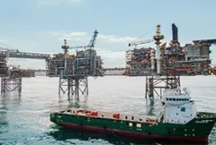 Illustration of an offshore oil and gas platform equipped with advanced digital control systems, automation technology, and real-time monitoring displays. The image represents ABB's modernization of the Buzzard platform, highlighting improved operational reliability, process optimization, predictive maintenance, enhanced efficiency, and extended production capabilities in the North Sea energy sector.
