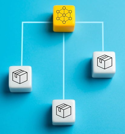 Abstract image of three blocks converging into a gold cube, representing single-vendor consolidation benefits in procurement